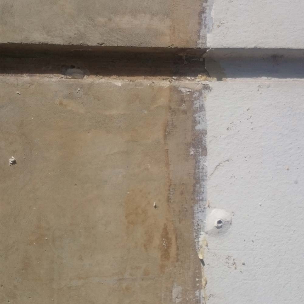 Fassadenfarbentfernung - vorher und nachher.